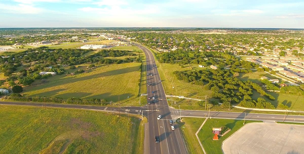 Aerial view of road in suburban area