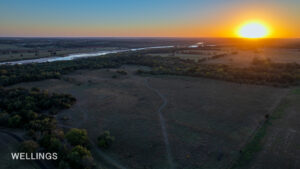 Wide aerial view of Lost Creek and adjacent open land within Lost Creek 158 property