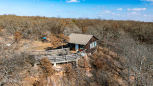 Ranch cabin with patio deck overlooking valley on The Floyd Ranch in Garvin County