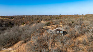 Ranch cabin with patio deck overlooking valley on The Floyd Ranch in Garvin County