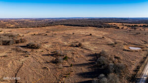 Wide aerial showing ranch boundary and grass pastures of The Floyd Ranch