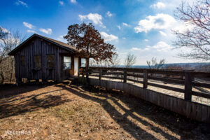 Ranch cabin with patio deck overlooking valley on The Floyd Ranch in Garvin County”