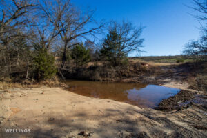 Interior ranch road and perimeter fencing on The Floyd Ranch, Garvin County